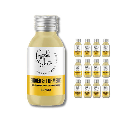 Bottle of Ginger & Turmeric shake with multiple smaller bottles on a white background