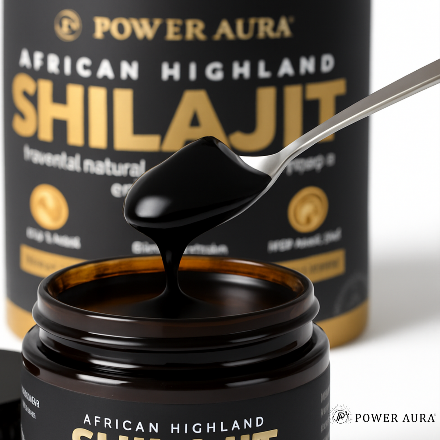 Power Aura African Highland Shilajit with a spoonful of the product over a jar.