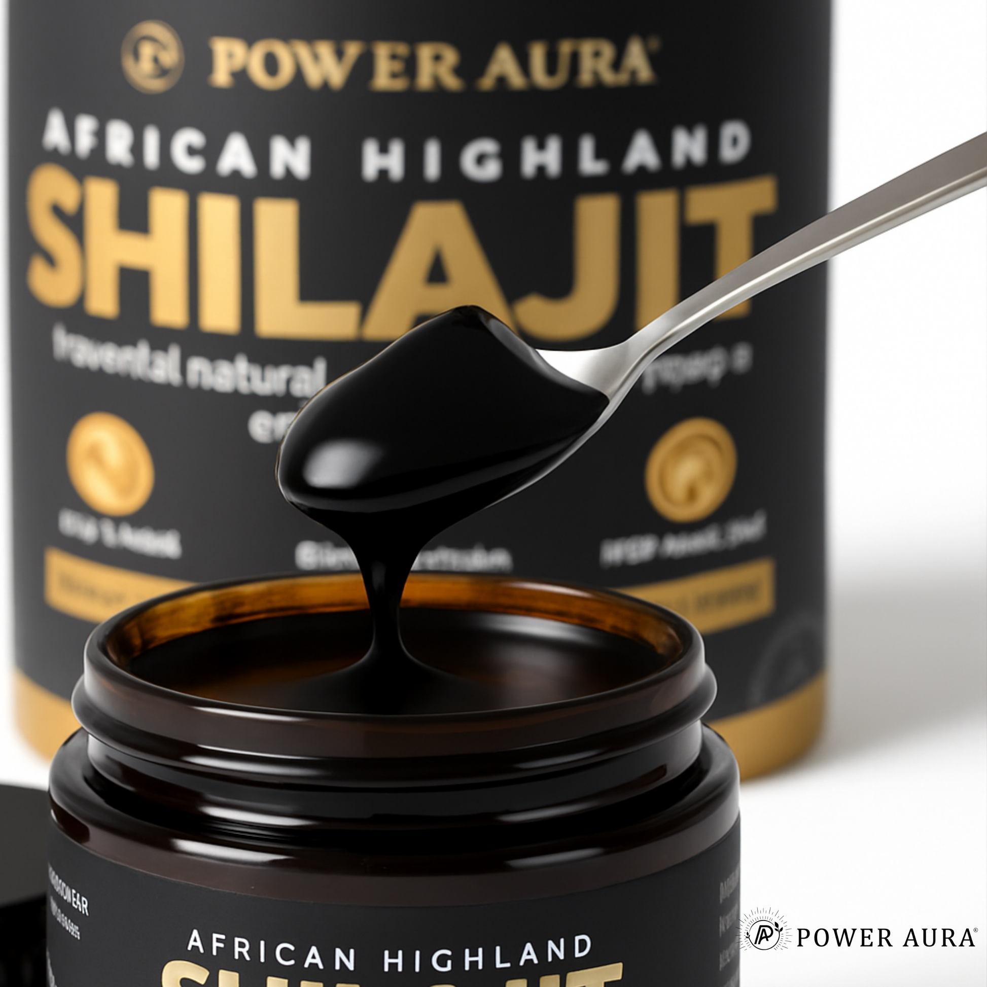 Power Aura African Highland Shilajit with a spoonful of the product over a jar.