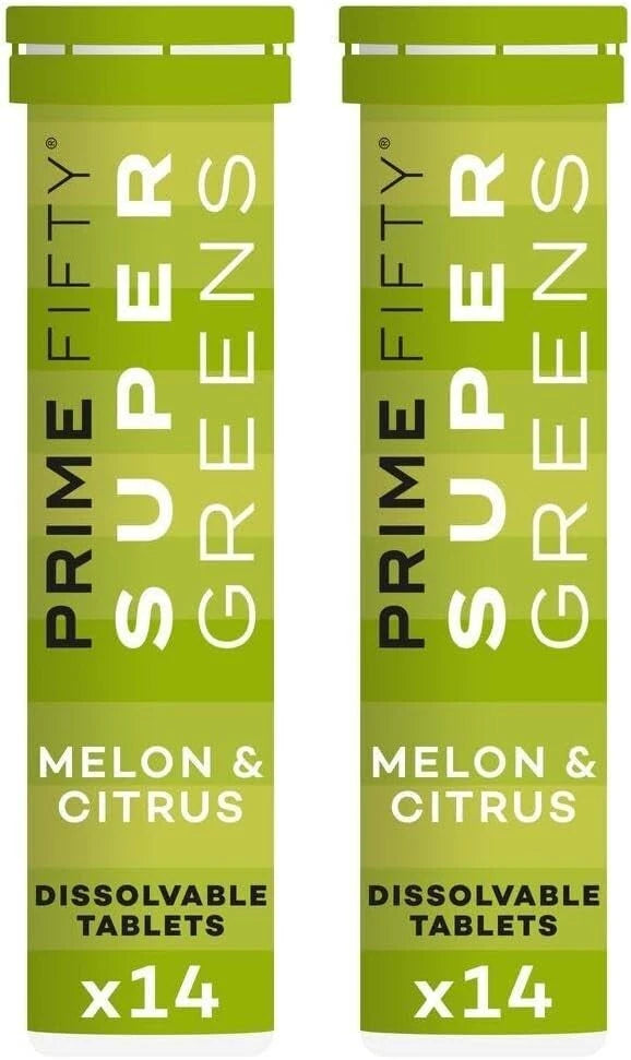 Two packages of Prime Fifty Super Greens Melon & Citrus dissolvable tablets on a white background.